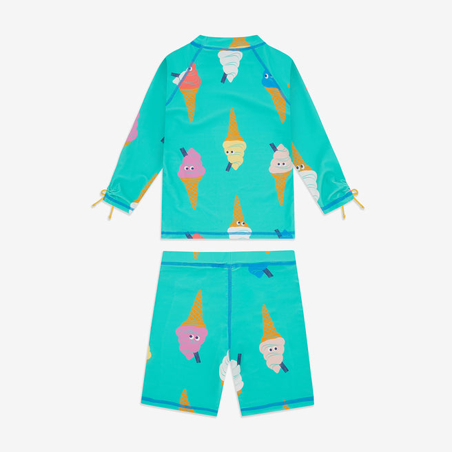 A UV Protective Surf Set in green with an ice cream pattern. The set includes a long-sleeve top and shorts.